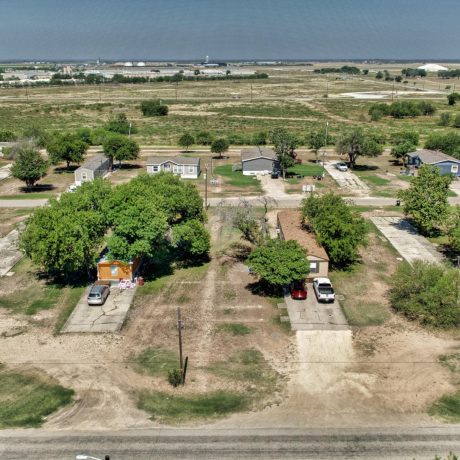 A rustic mobile home community surrounded by big Texas skies and sprawling landscapes at Sunset Mobile Home Park in Hondo, TX.